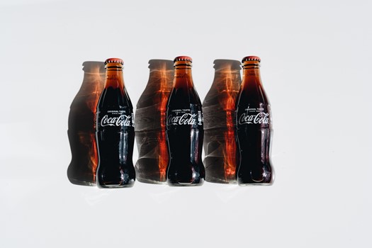 If Coca-Cola is only in a glass bottle. Why?
